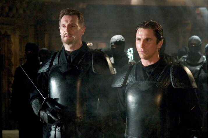 Liam Neeson and Christian Bale in Batman Begins.